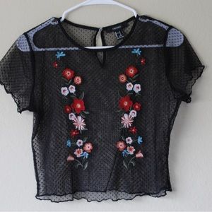 Sheer crop top with floral embroidery in the front